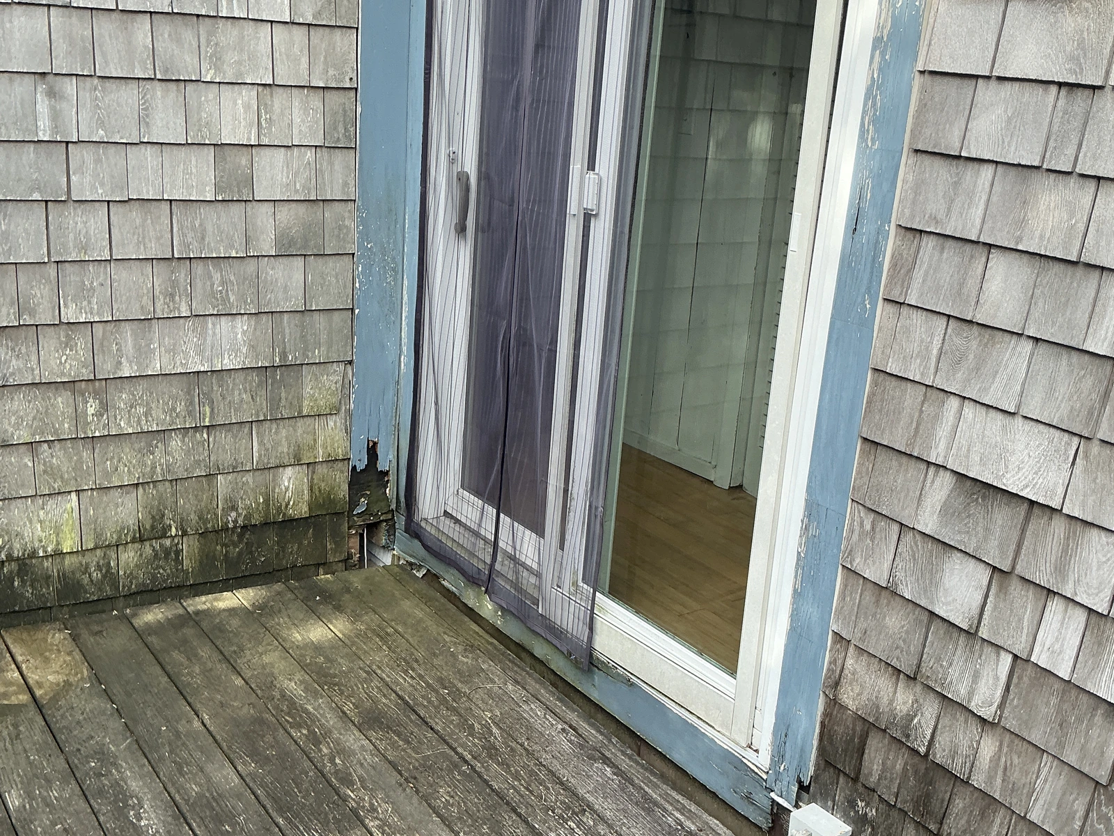 Rear deck of Ag na Farraige on day one of renovation.